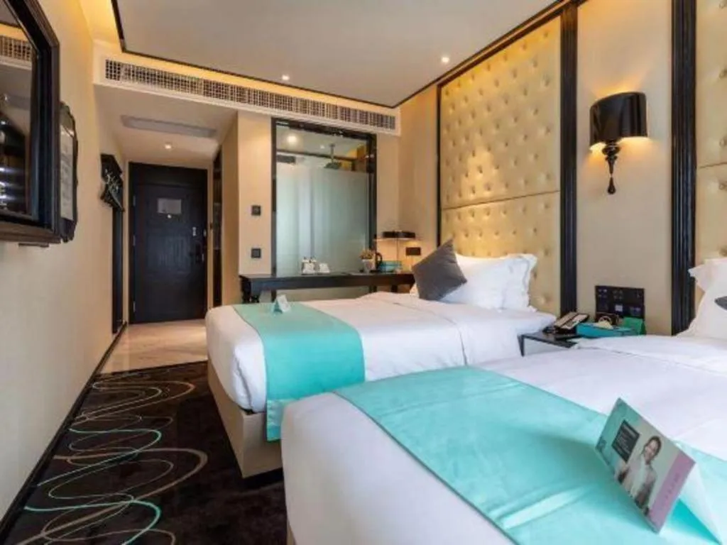 Bed in Xana Hotelle·Guangzhou Shangxiajiu Yongqingfang Changshou Road Metro Station