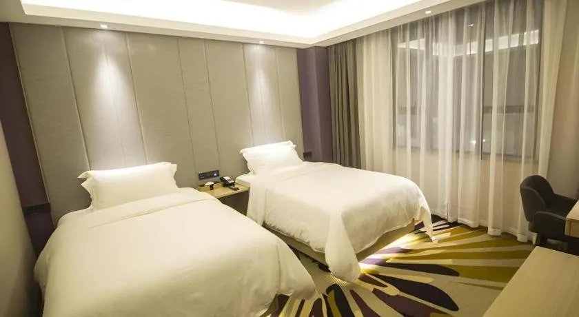 Bed in Lavande Hotel·Heyuan Bavaria