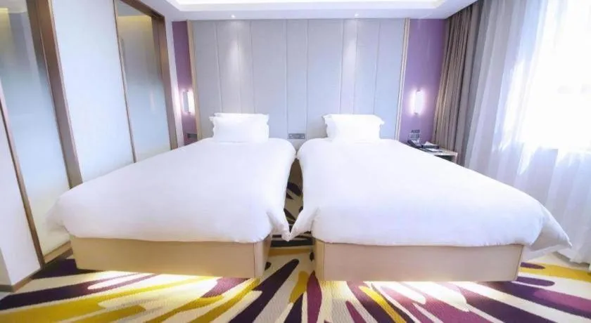 Bed in Lavande Hotel·Heyuan Bavaria