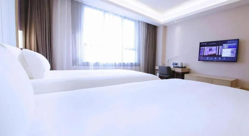 Bed in Lavande Hotel·Heyuan Bavaria