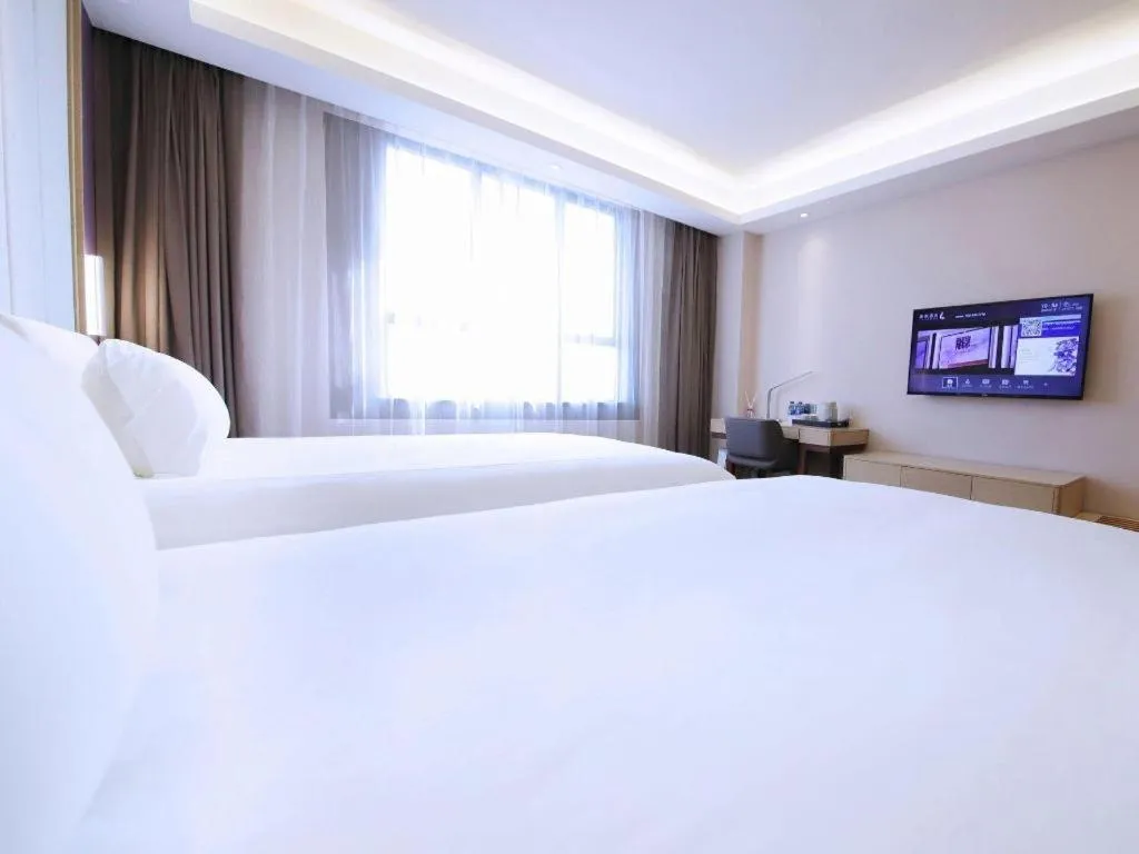 Bed in Lavande Hotel·Heyuan Bavaria