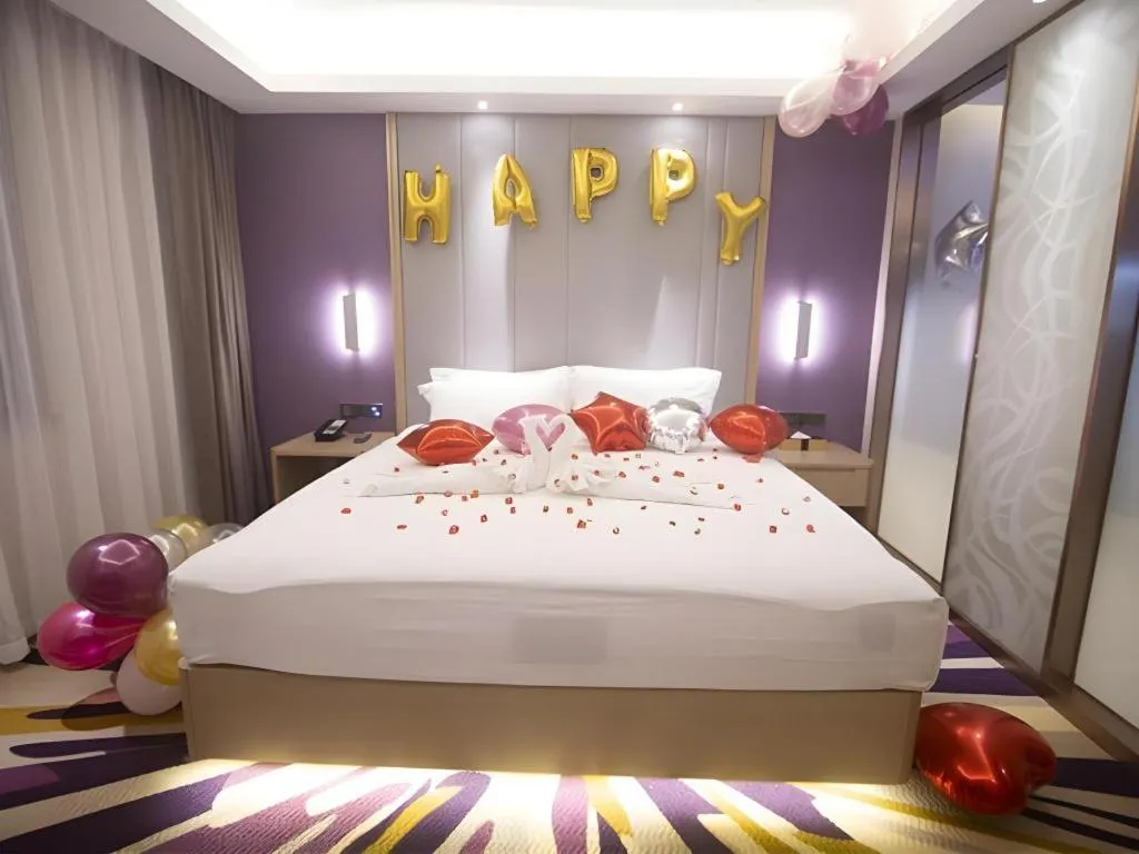 Bed in Lavande Hotel·Heyuan Bavaria