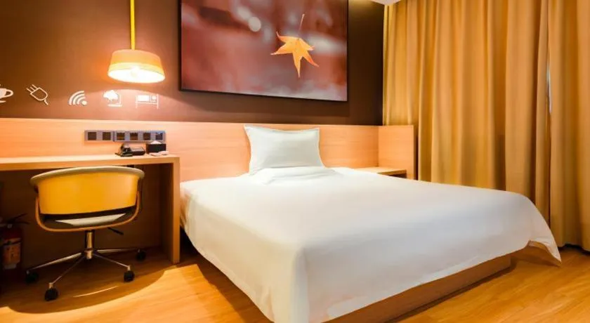Bed in IU Hotel·Tianjin Binhai New District Yanghuo Market