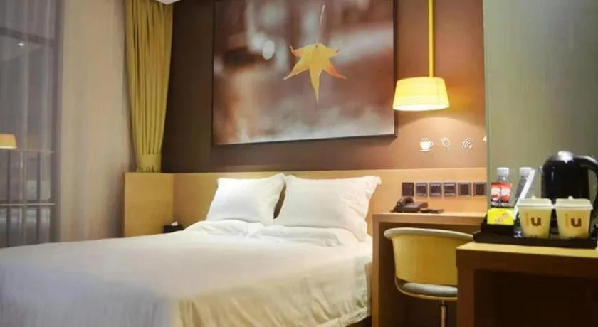 Bed in IU Hotel·Tianjin Binhai New District Yanghuo Market