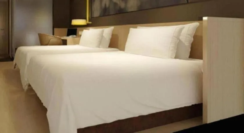 Bed in IU Hotel·Tianjin Binhai New District Yanghuo Market