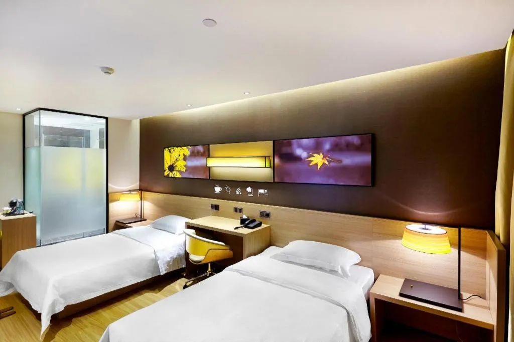 Bed in IU Hotel·Tianjin Binhai New District Yanghuo Market