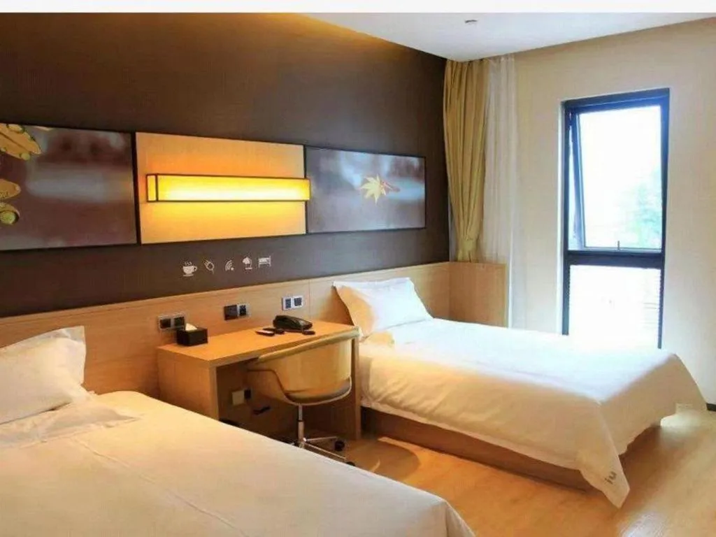 Bed in IU Hotel·Tianjin Binhai New District Yanghuo Market