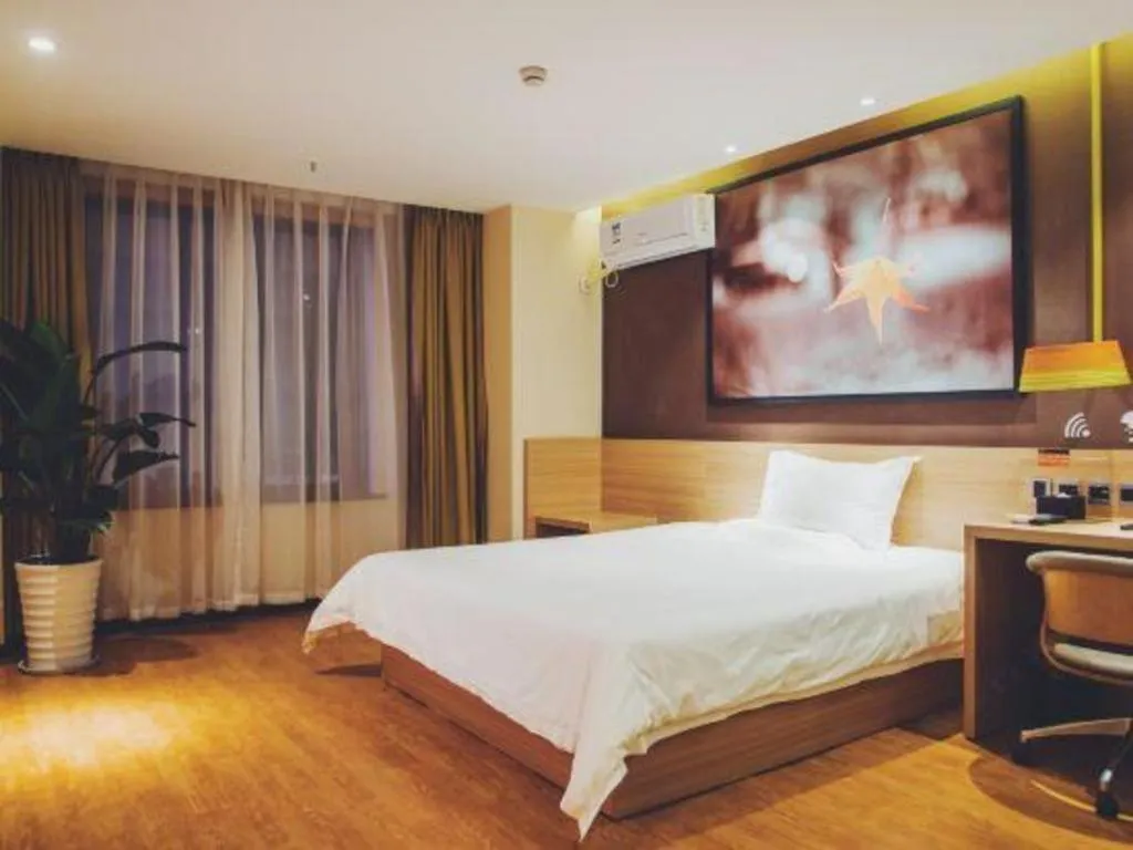 Bed in IU Hotel·Tianjin Binhai New District Yanghuo Market