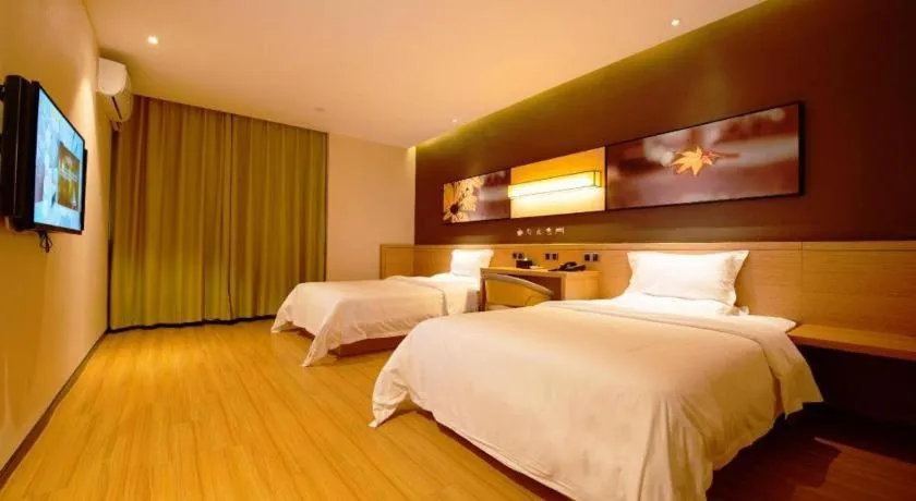 Bed in IU Hotel·Tianjin Binhai New District Yanghuo Market