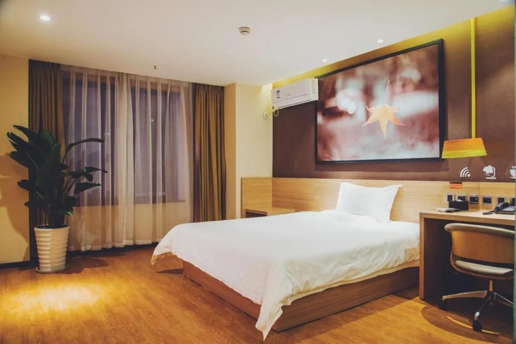 Bed in IU Hotel·Tianjin Binhai New District Yanghuo Market