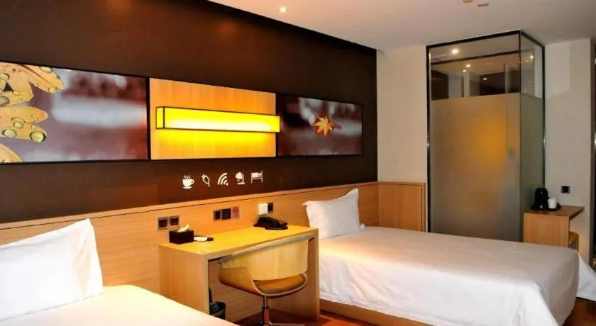 Bed in IU Hotel·Tianjin Binhai New District Yanghuo Market