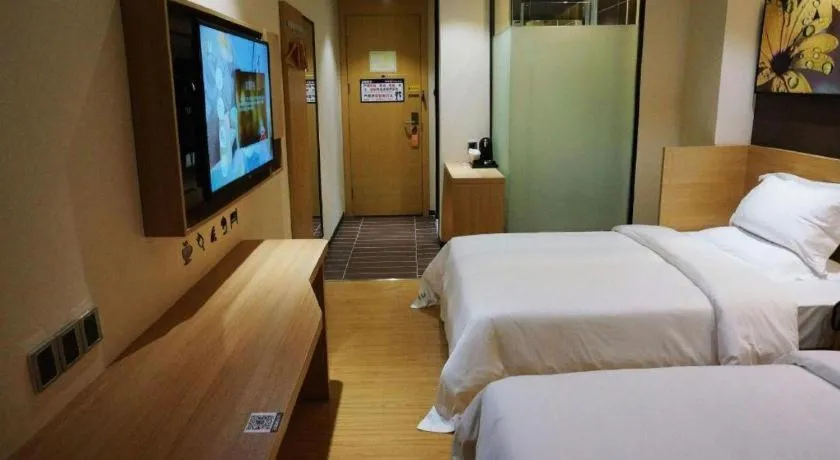 Bed in IU Hotel·Tianjin Binhai New District Yanghuo Market