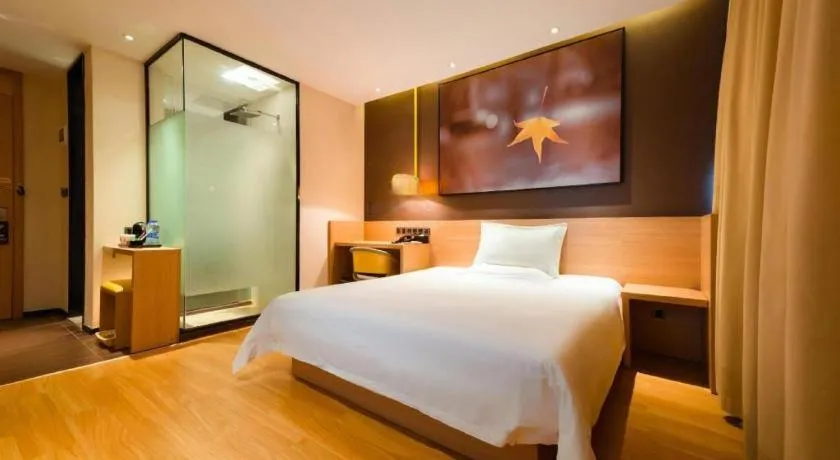 Bed in IU Hotel·Tianjin Binhai New District Yanghuo Market