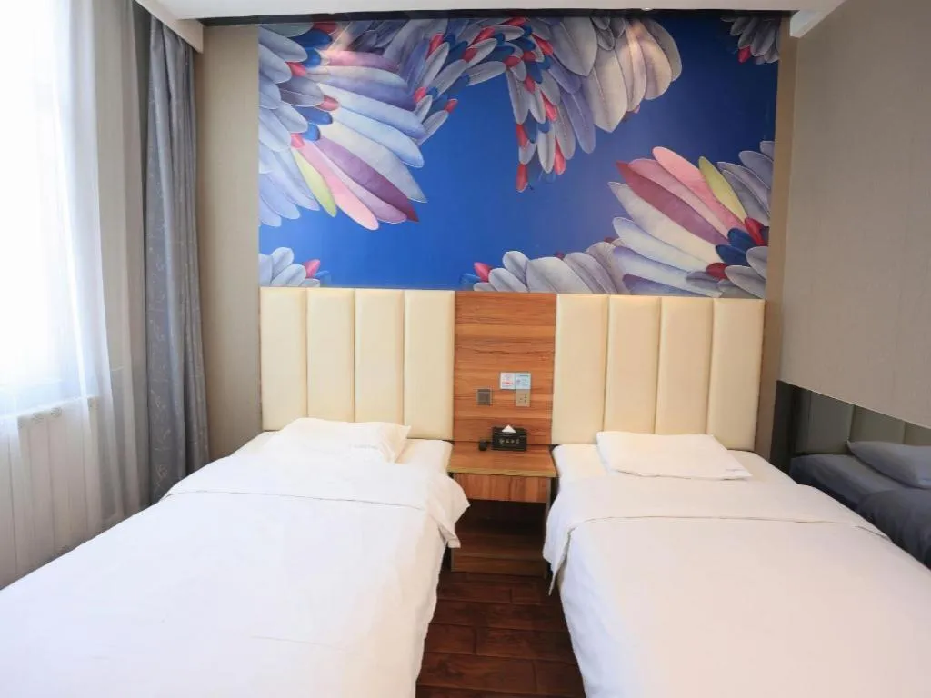Bed in PAI Hotel Huayin Huashan Mountain Scenic Spot Ancient Street