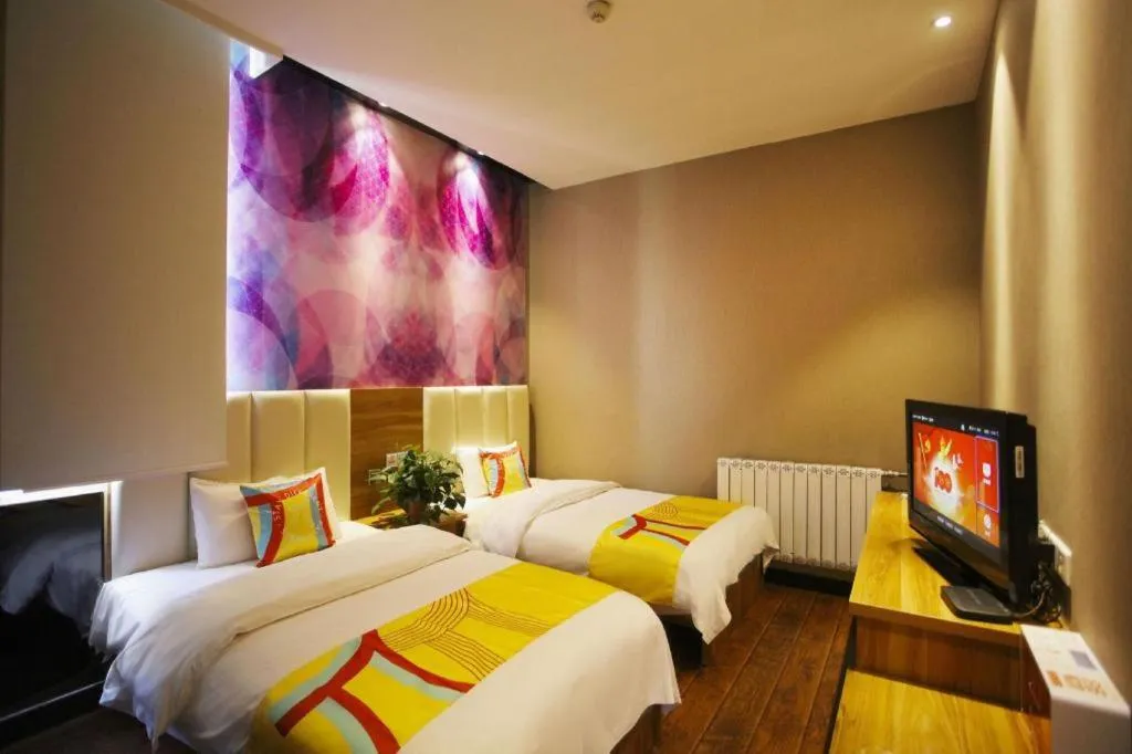 Bed in PAI Hotel Huayin Huashan Mountain Scenic Spot Ancient Street