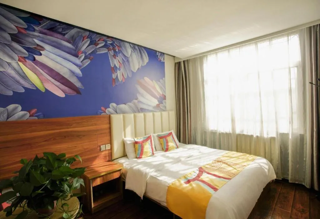 Bed in PAI Hotel Huayin Huashan Mountain Scenic Spot Ancient Street