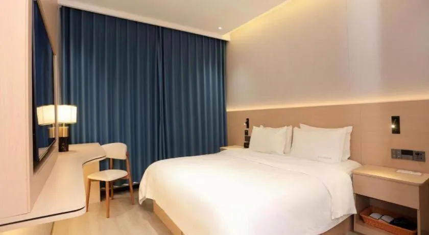 Bed in PAI Hotel Huayin Huashan Mountain Scenic Spot Ancient Street