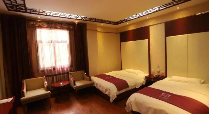 Bed in PAI Hotel Huayin Huashan Mountain Scenic Spot Ancient Street