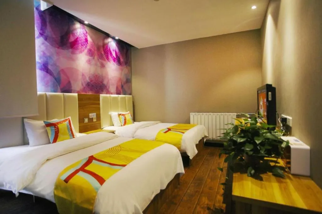 Bed in PAI Hotel Huayin Huashan Mountain Scenic Spot Ancient Street