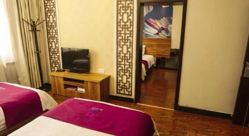 Bed in PAI Hotel Huayin Huashan Mountain Scenic Spot Ancient Street