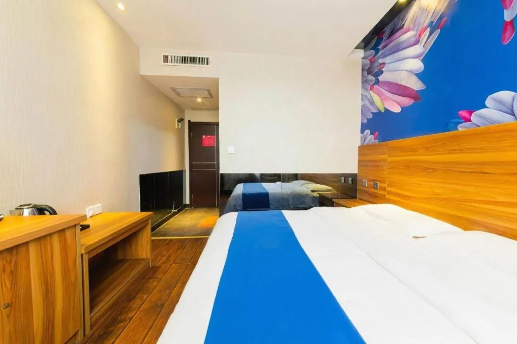 Bed in PAI Hotel Huayin Huashan Mountain Scenic Spot Ancient Street