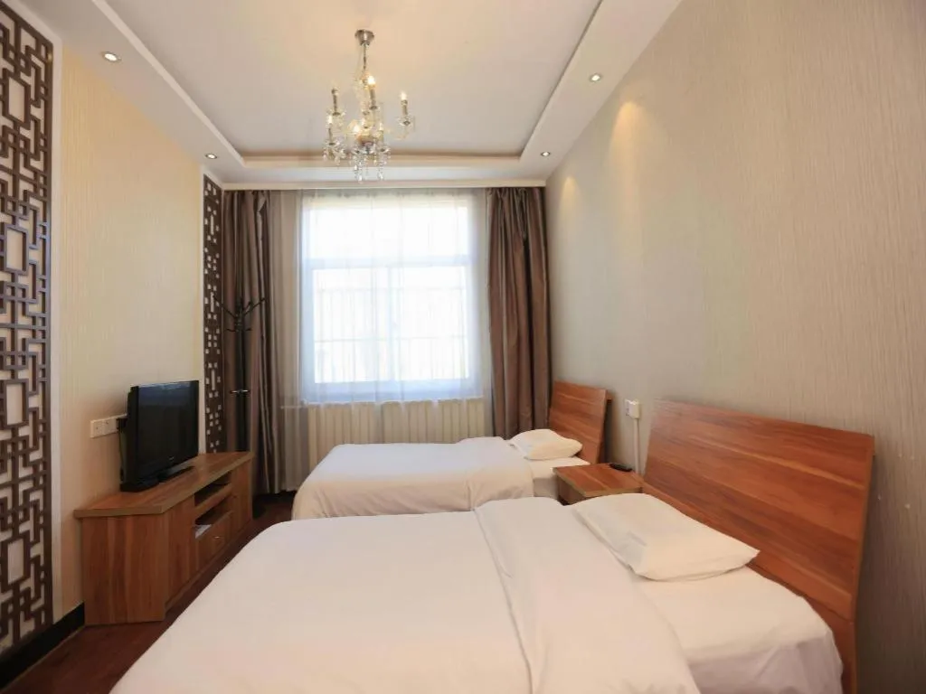 Bed in PAI Hotel Huayin Huashan Mountain Scenic Spot Ancient Street