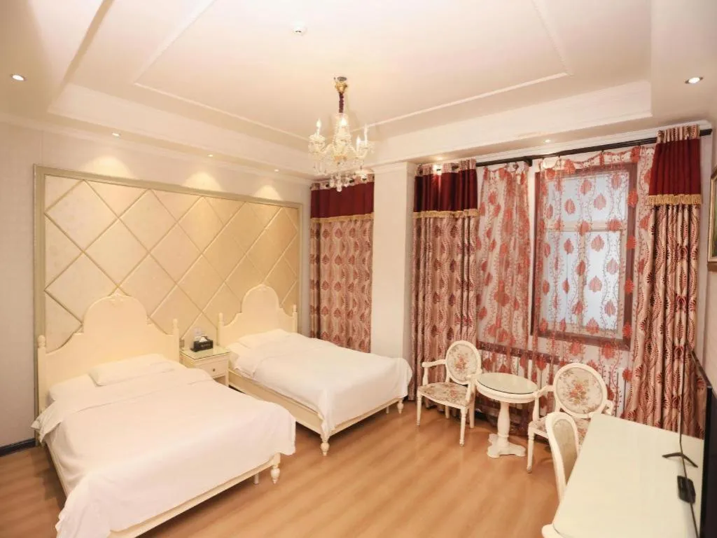 Bed in PAI Hotel Huayin Huashan Mountain Scenic Spot Ancient Street