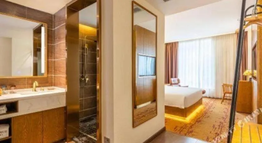 Bed in James Joyce Coffetel·Chadianzi Passenger Terminal Jinke Bei Road Metro Station