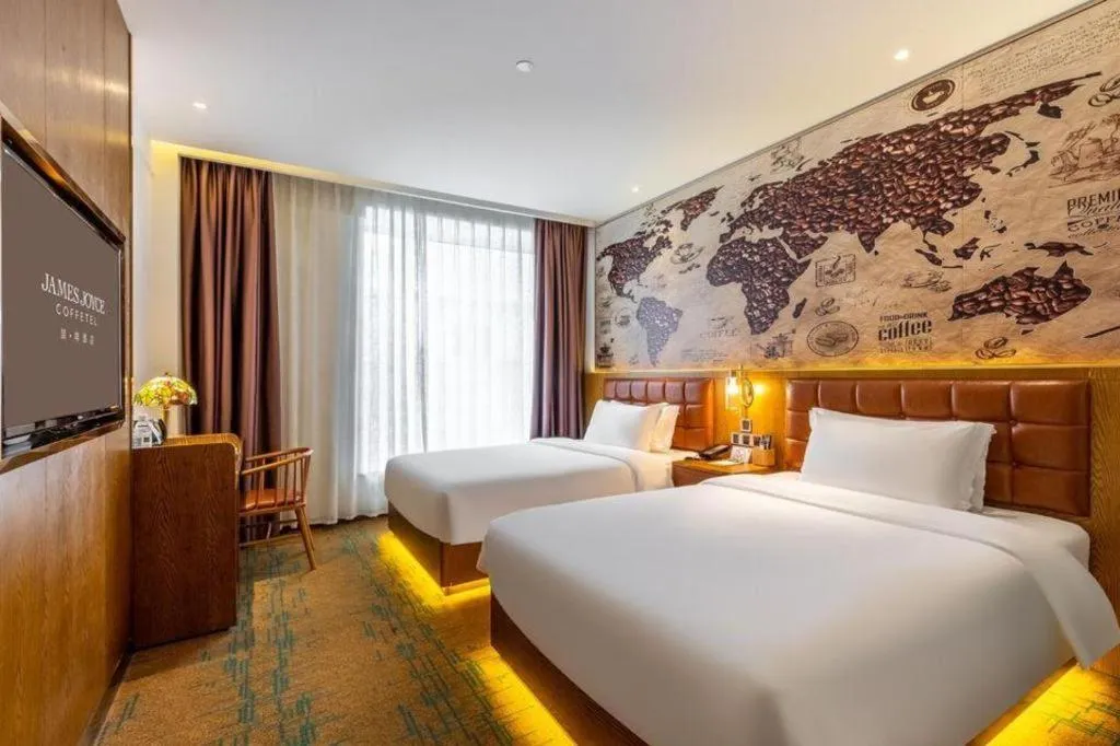 Bed in James Joyce Coffetel·Chadianzi Passenger Terminal Jinke Bei Road Metro Station