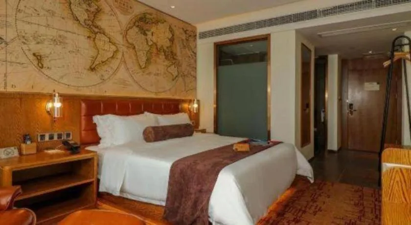 Bed in James Joyce Coffetel·Chadianzi Passenger Terminal Jinke Bei Road Metro Station