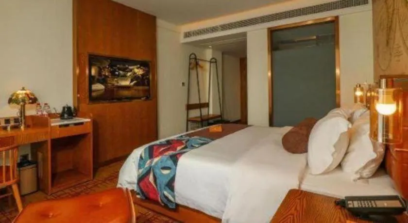 Bed in James Joyce Coffetel·Chadianzi Passenger Terminal Jinke Bei Road Metro Station