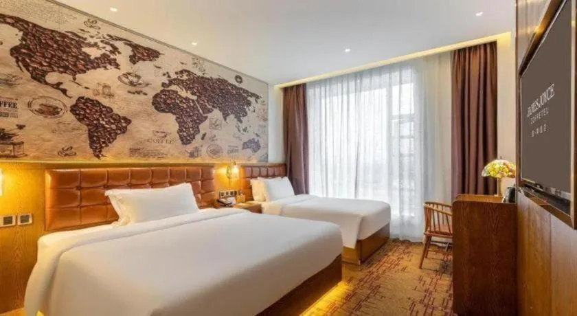 Bed in James Joyce Coffetel·Chadianzi Passenger Terminal Jinke Bei Road Metro Station