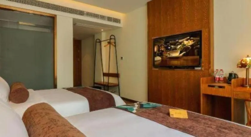 Bed in James Joyce Coffetel·Chadianzi Passenger Terminal Jinke Bei Road Metro Station