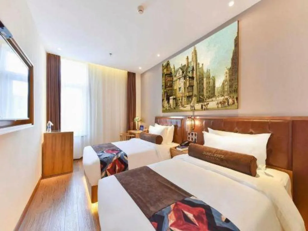 Bed in James Joyce Coffetel Beijing South Station Guang'anmen You'an Hospital