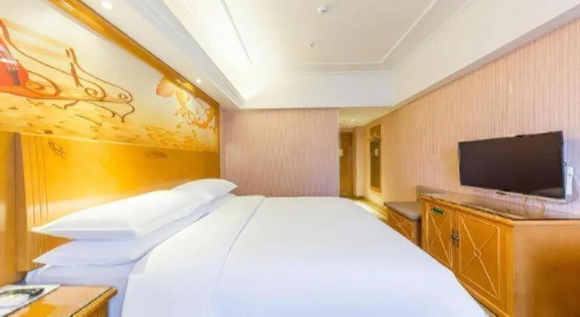 Bed in Vienna Hotel Inner Mongolia Hohhot Railway Station Gongzhufu Metro Station