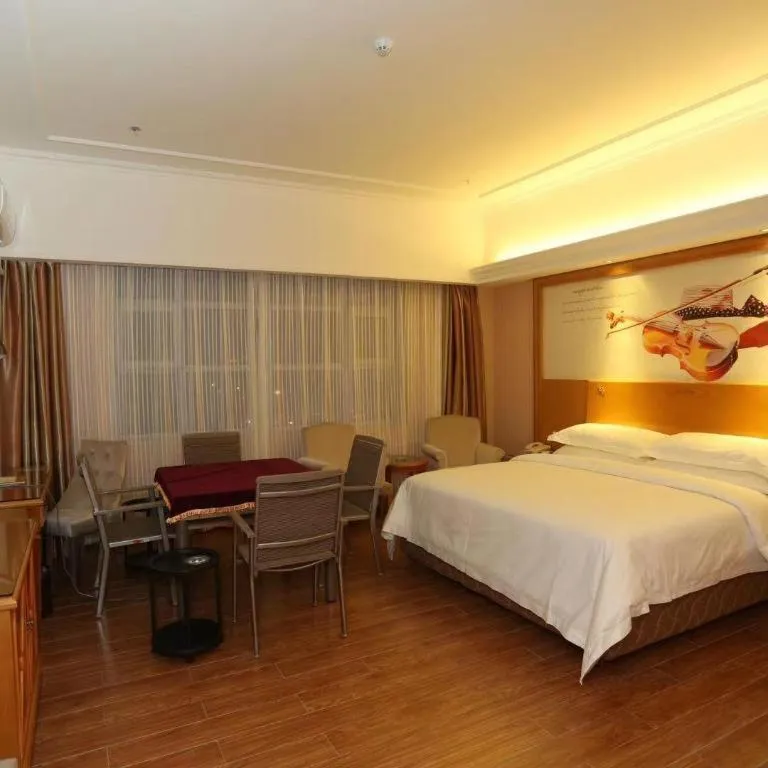 Bed in Vienna Hotel Inner Mongolia Hohhot Railway Station Gongzhufu Metro Station