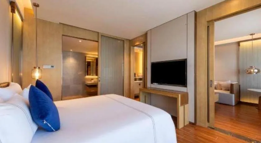 Bed in AUGUSTINE HOTEL