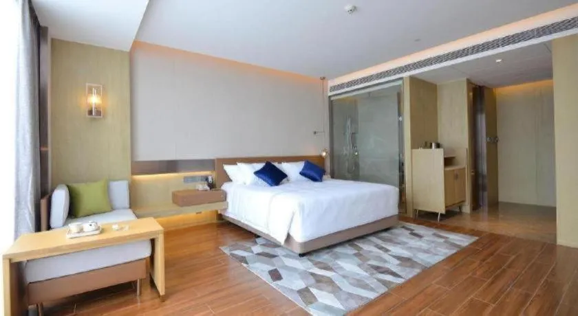 Bed in AUGUSTINE HOTEL