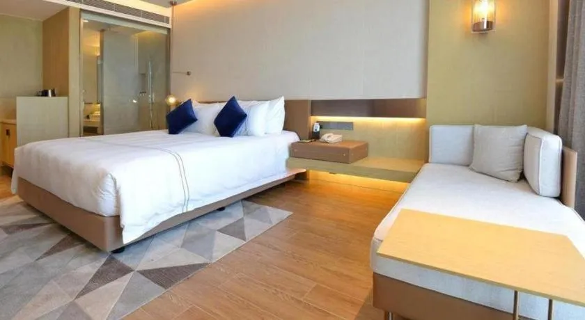 Bed in AUGUSTINE HOTEL