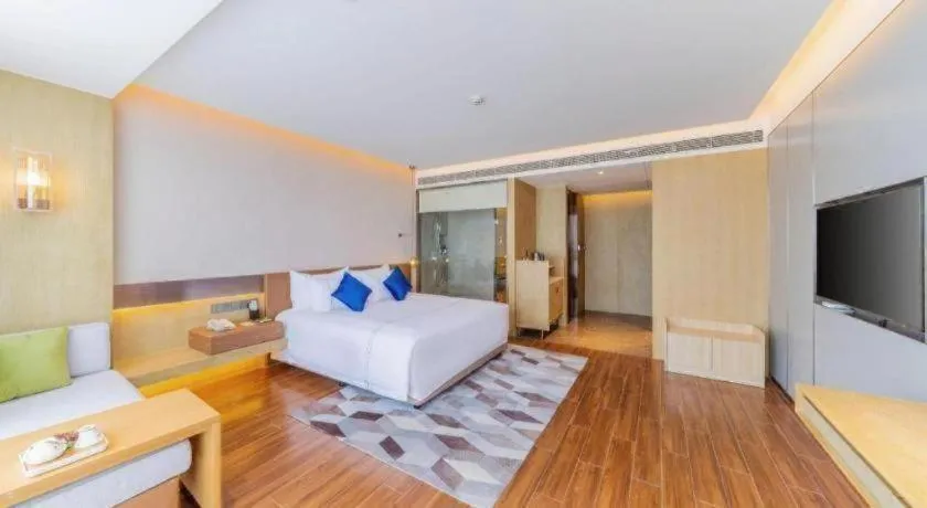 Bed in AUGUSTINE HOTEL