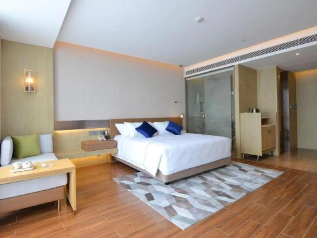 Bed in AUGUSTINE HOTEL