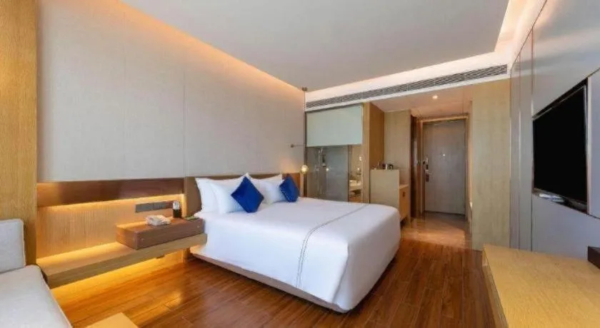 Bed in AUGUSTINE HOTEL