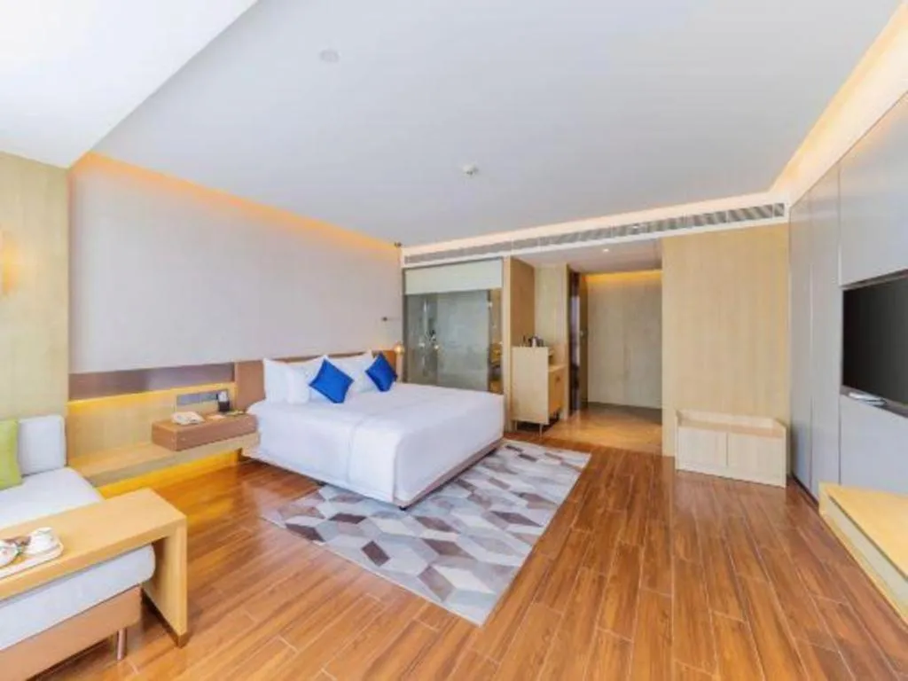 Bed in AUGUSTINE HOTEL