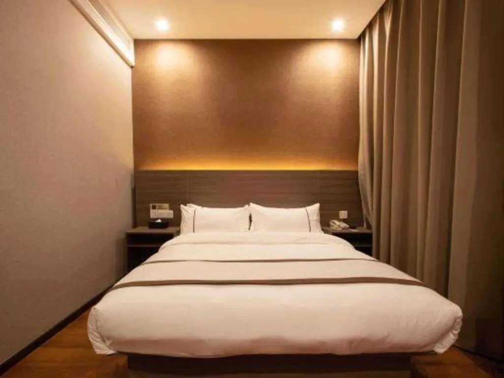 Bed in Jtour Inn Wuxi Meiyuan Kaiyuan Temple Metro