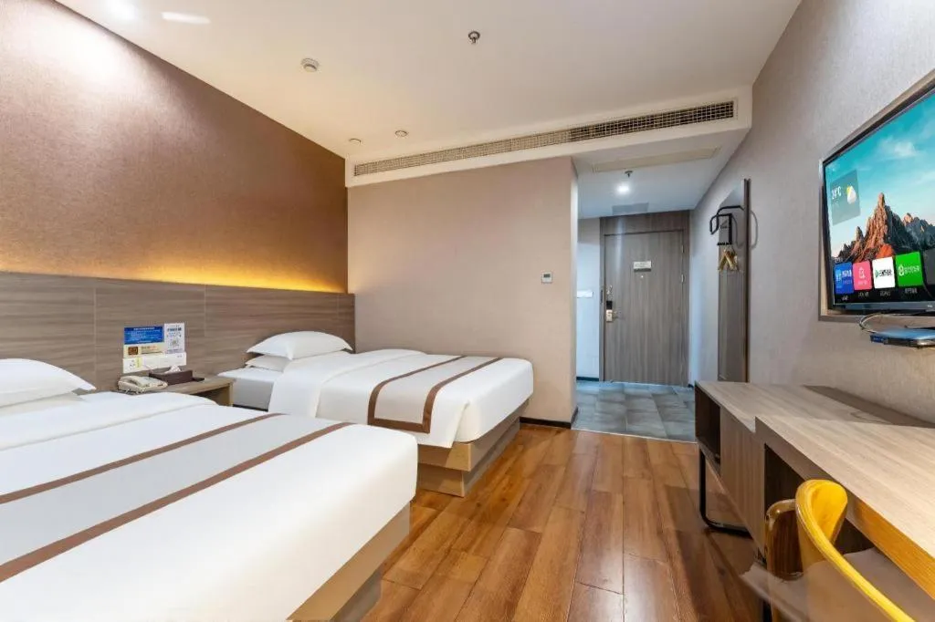 Bed in Jtour Inn Wuxi Meiyuan Kaiyuan Temple Metro