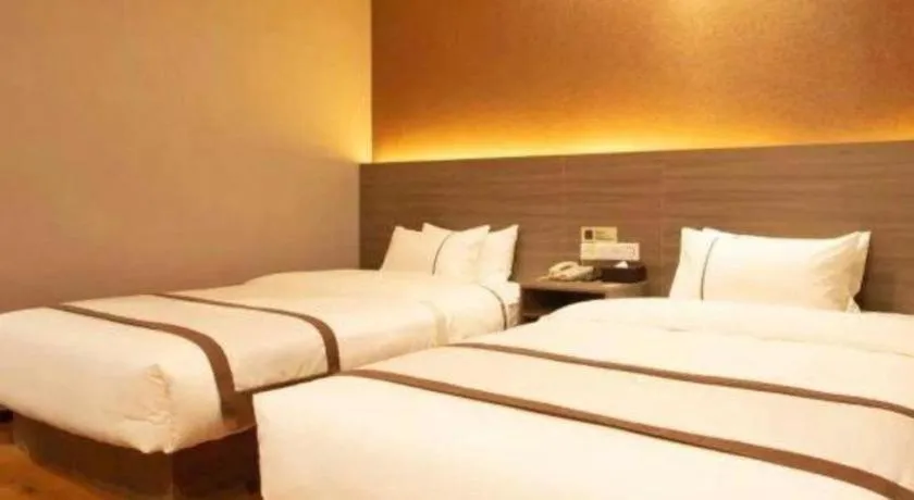 Bed in Jtour Inn Wuxi Meiyuan Kaiyuan Temple Metro