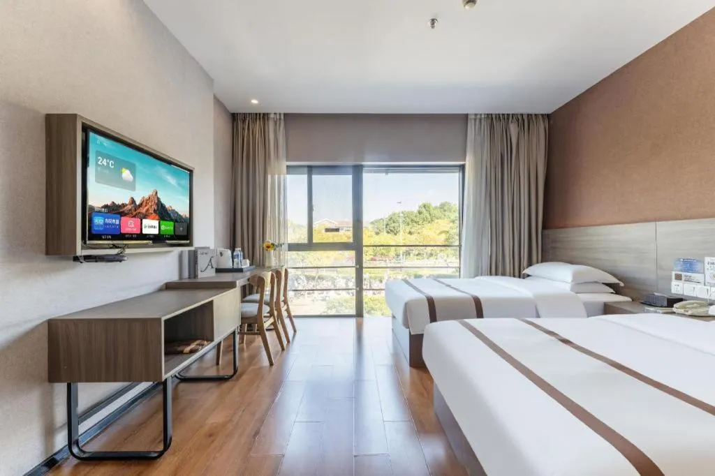 Bed in Jtour Inn Wuxi Meiyuan Kaiyuan Temple Metro