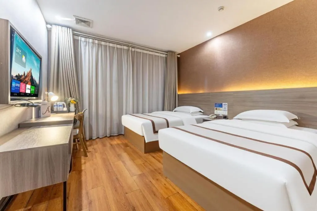 Bed in Jtour Inn Wuxi Meiyuan Kaiyuan Temple Metro