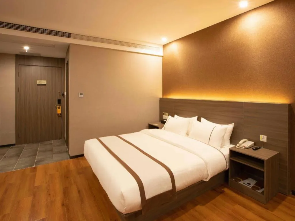 Bed in Jtour Inn Wuxi Meiyuan Kaiyuan Temple Metro