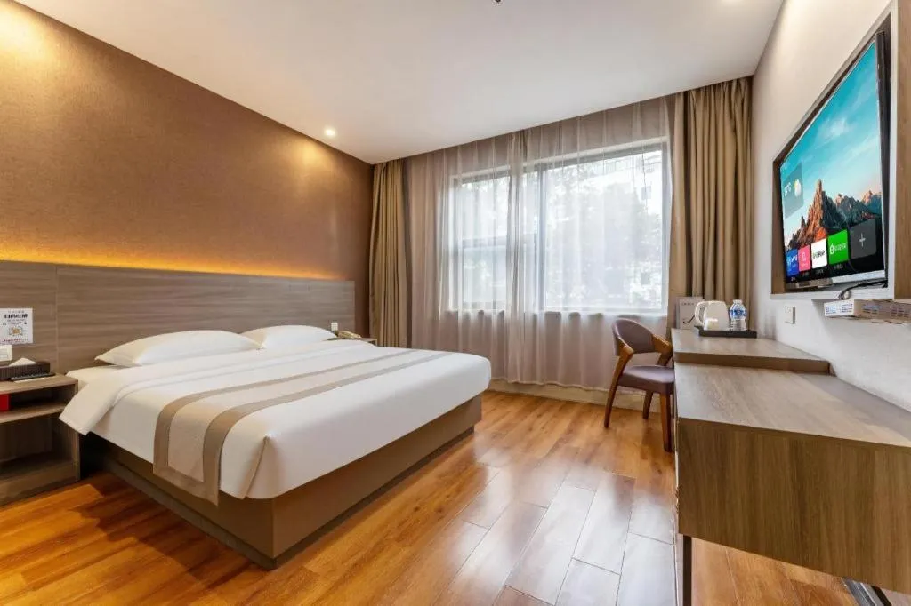 Bed in Jtour Inn Wuxi Meiyuan Kaiyuan Temple Metro